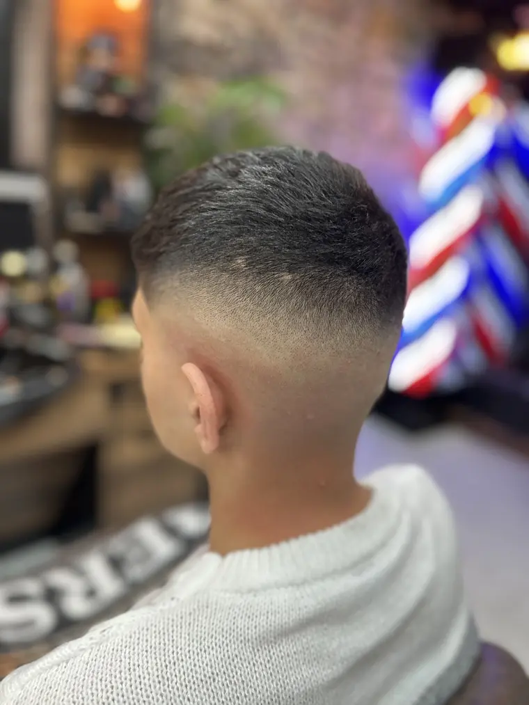 Back fade blended to the skin at Galaxy Barber